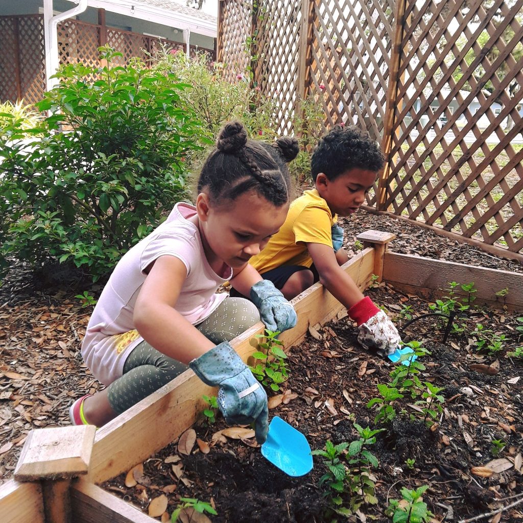 Kids working in the Sensory Garden at The Florida Center's Starfish Academy