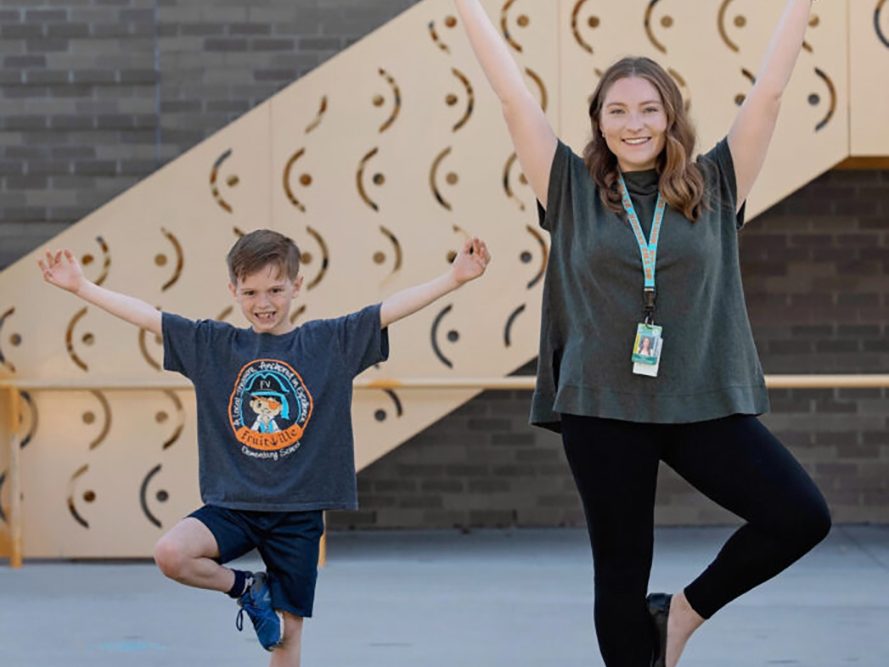 School-based mental health counselor and student