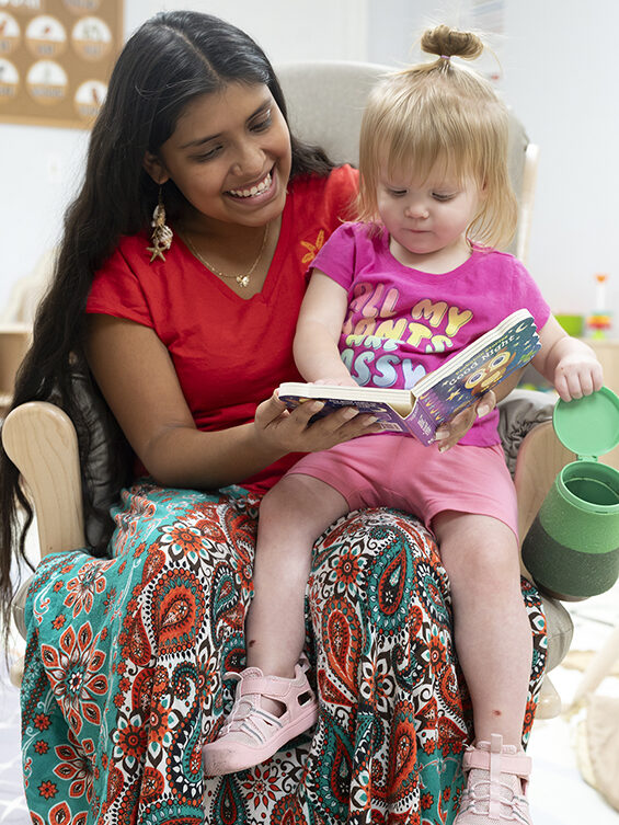 Starfish Academy teacher student reading a book